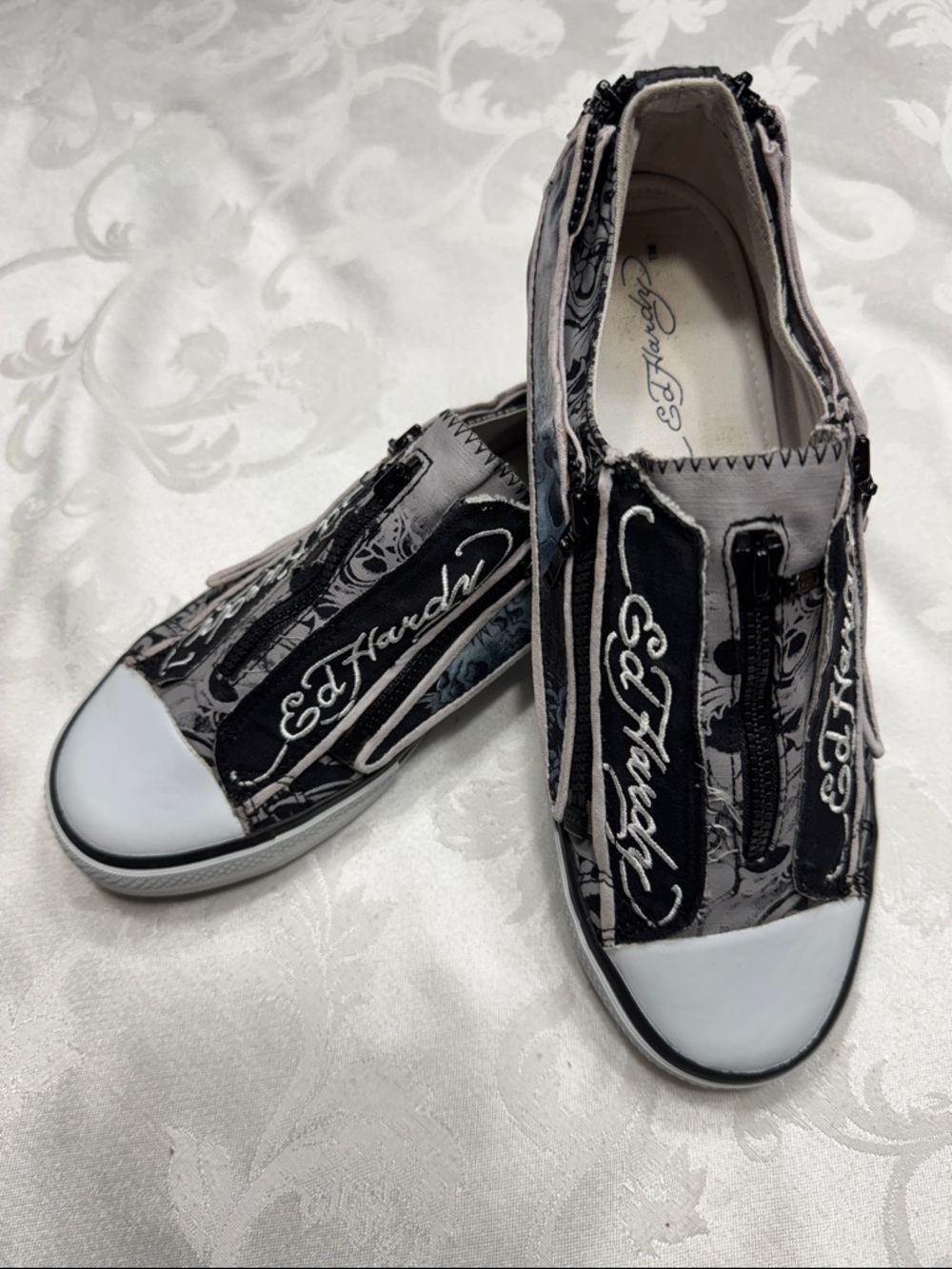 Women’s Ed Hardy low top skull slip on canvas sneakers. Size 7.